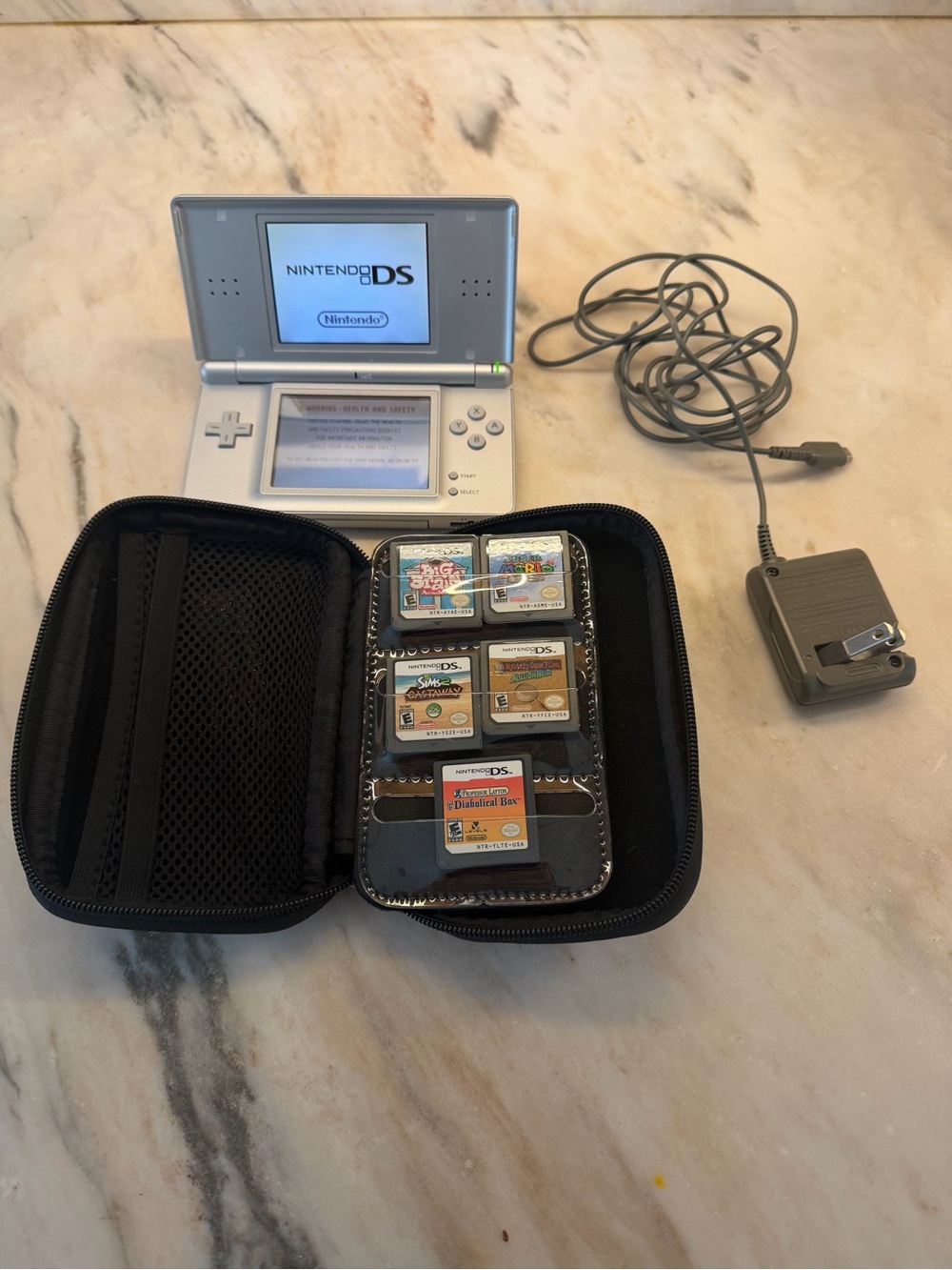 Nintendo Silver DS Lite Console with Games Case and Charger
